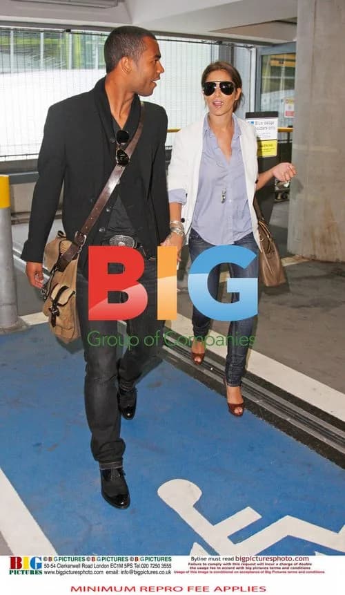 Ashley and Cheryl Cole arrive in the UK
