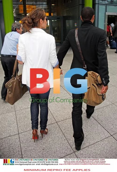 Ashley and Cheryl Cole arrive in UK