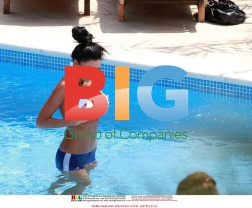 Katie Price Sunbathes in Ibiza