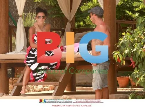 Katie Price sunbathes in Ibiza