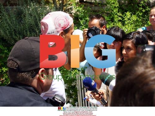 Cristiano Ronaldo greets press outside villa