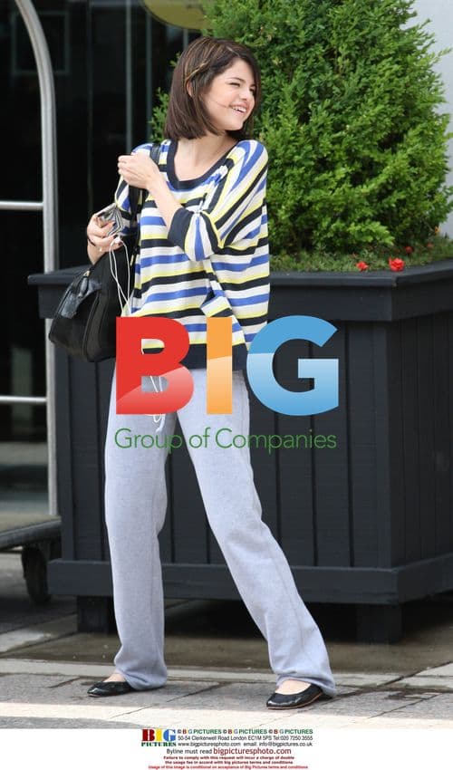 Selena Gomez Departs Toronto Hotel with Step-Dad