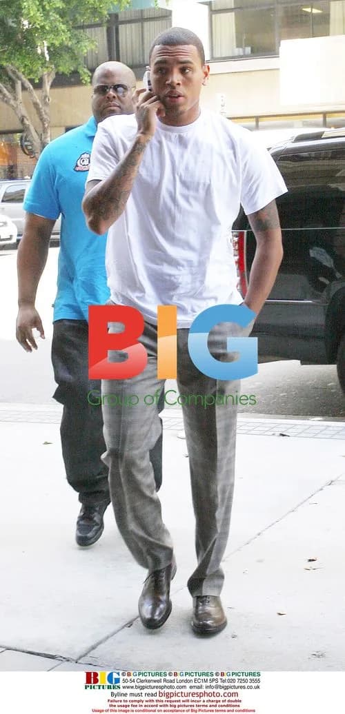 Chris Brown arrives at lawyer's office before court case