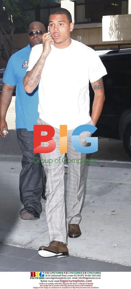 Chris Brown at lawyer's office before court