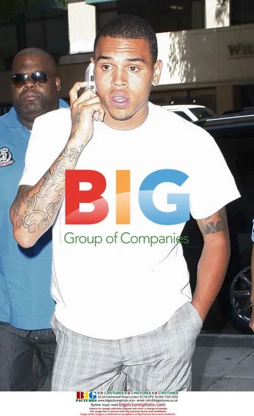 Chris Brown arrives at lawyer's office before court