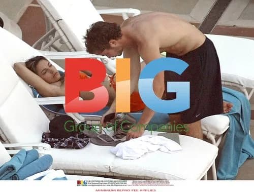 Kelly Brook and Danny Cipriani Poolside