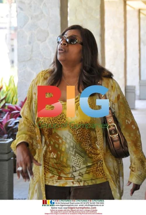 Gloria Gaynor smiles on golf cart in Acapulco