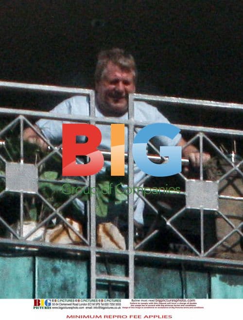 Ryan O'Neal on Farrah Fawcett's balcony