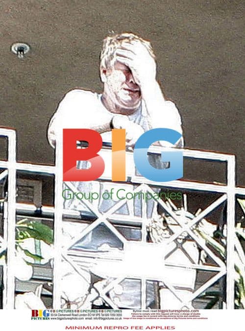 Ryan O'Neal on Farrah Fawcett's balcony