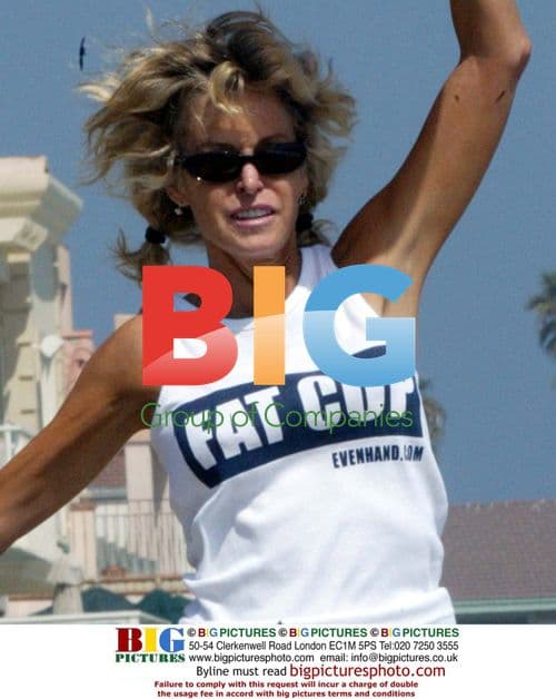 Ryan O'Neil and Farrah Fawcett With Son