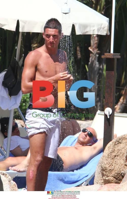Manchester United players relax poolside in Sardinia