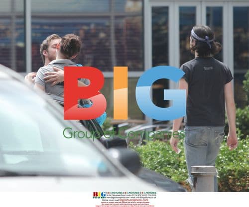 Anne Hathaway kisses boyfriend goodbye