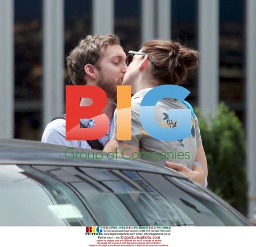 Anne Hathaway kisses boyfriend goodbye