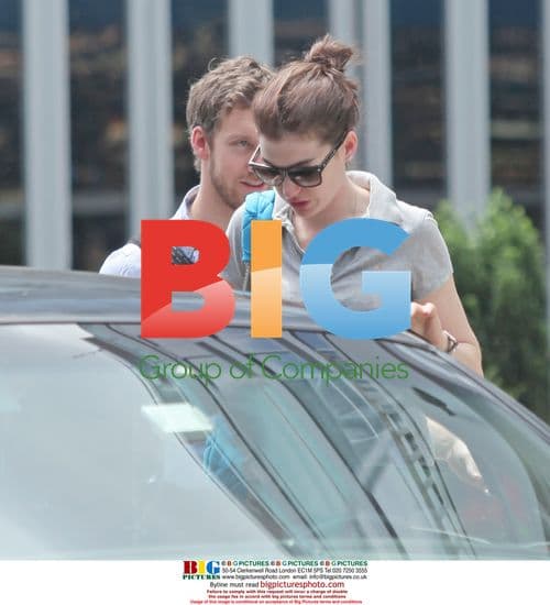 Anne Hathaway kisses boyfriend goodbye