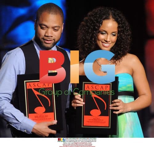 Alicia Keys and Kerry Brothers Accept Award