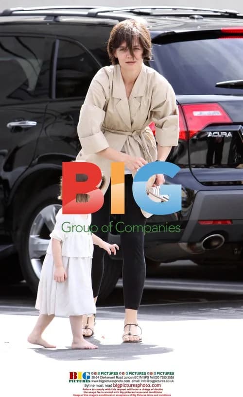 Suri Cruise exits art class with Katie Holmes