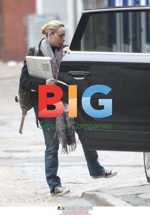 Assistant producer Lauren Meek walks dog