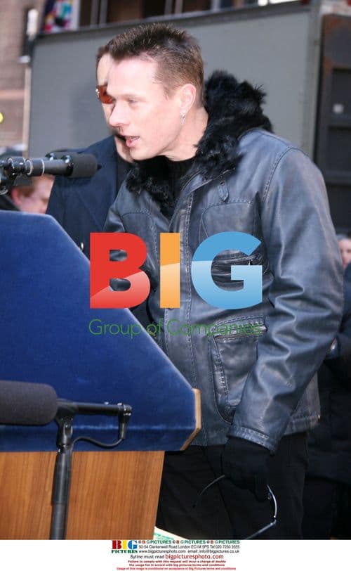 Larry Mullen Jr. and Michael Bloomberg at U2 Way press conference