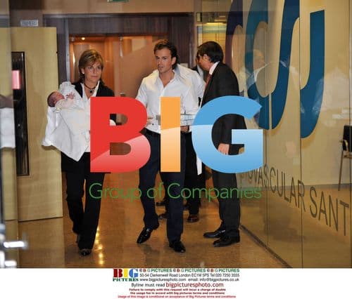 Arantxa Sanchez Vicario and husband with newborn