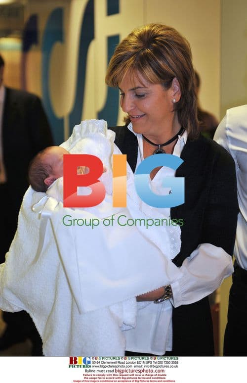 Arantxa Sanchez Vicario and husband present newborn
