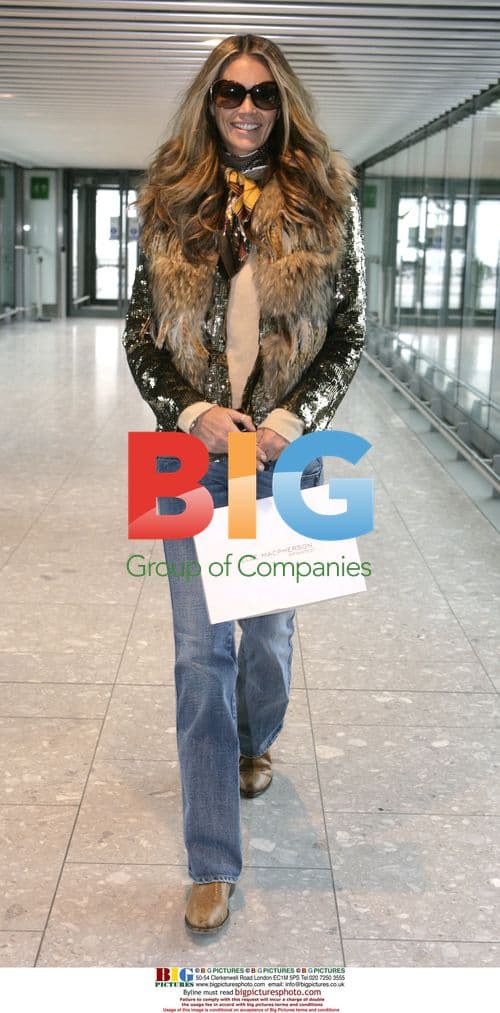Supermodel Elle Mcpherson departs Heathrow for Vienna