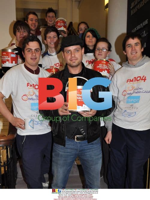 Boyzone Singer Keith Duffy Poses with Olympian Mei Lin Yap