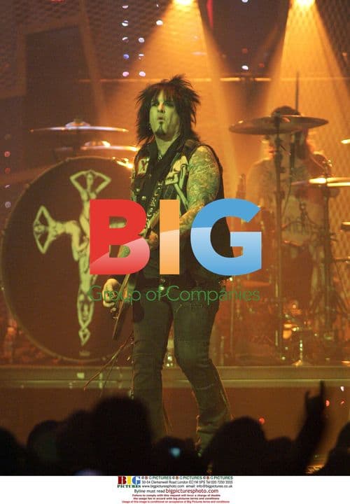 Nikki Sixx with Motley Crue performs in concert