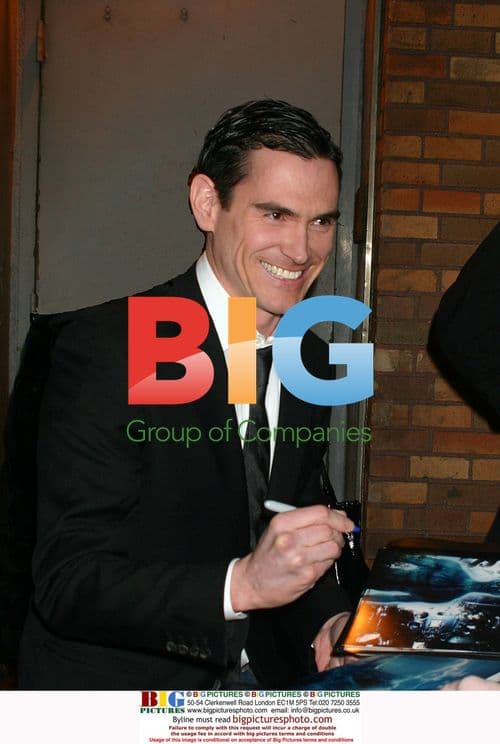 Billy Crudup signs 'Watchmen' memorabilia