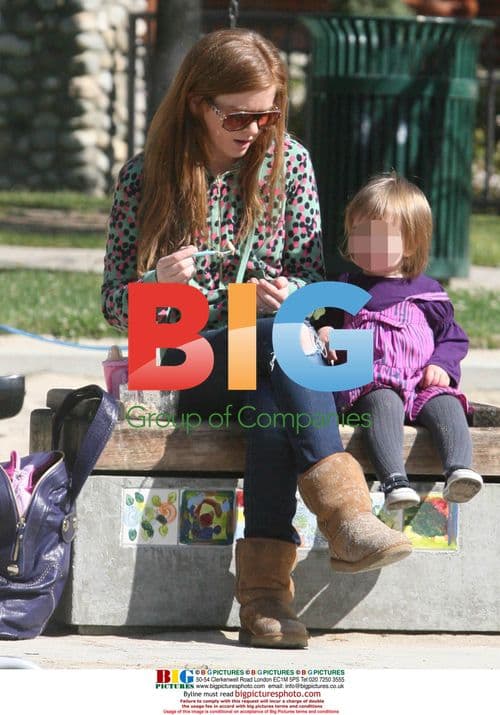 Isla Fisher and daughter Olive at park