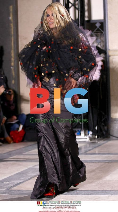 Pamela Anderson Surprises at Vivienne Westwood Show