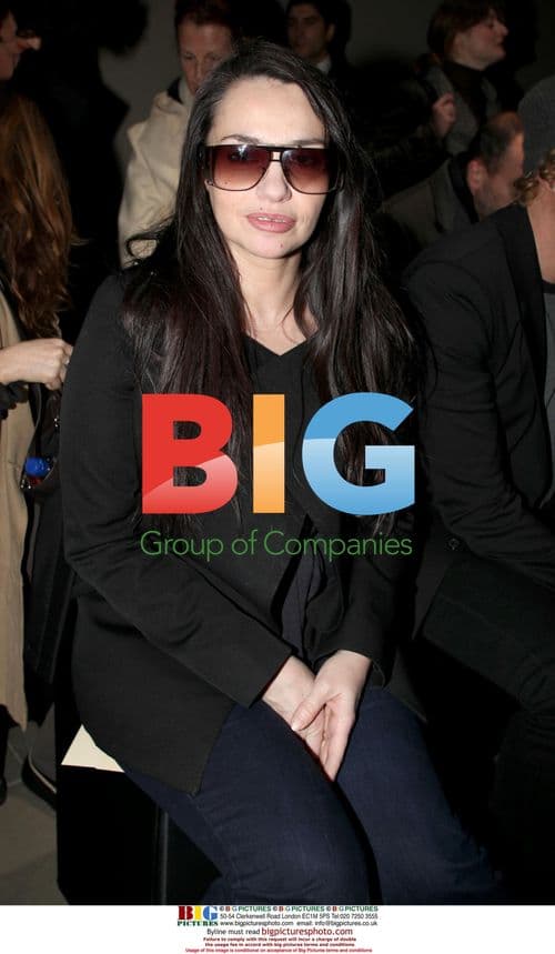 Beatrice Dalle at Paris Fashion Week