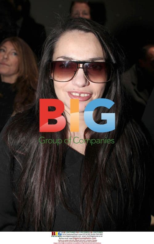 Beatrice Dalle at Givenchy Fashion Show