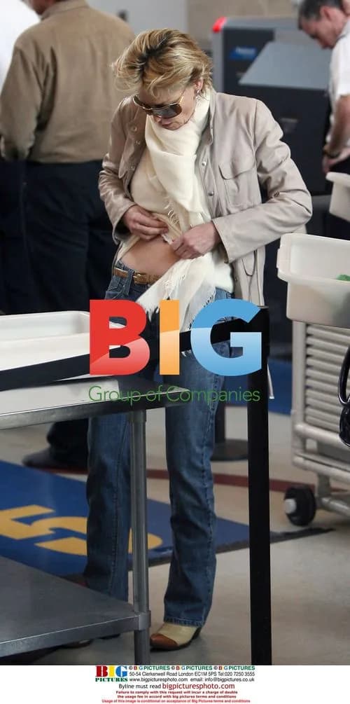 Sharon Stone Strips Down at LAX