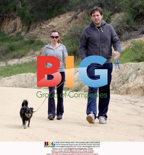 Christina Ricci and Owen Benjamin hiking with dog