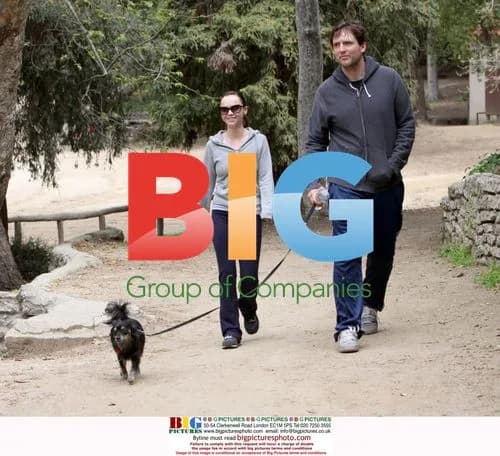 Christina Ricci and Owen Benjamin hike with dog
