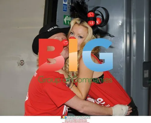 Caprice and Leigh Francis at Euston Station