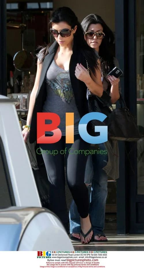 Kim and Kourtney Kardashian shopping in Beverly Hills