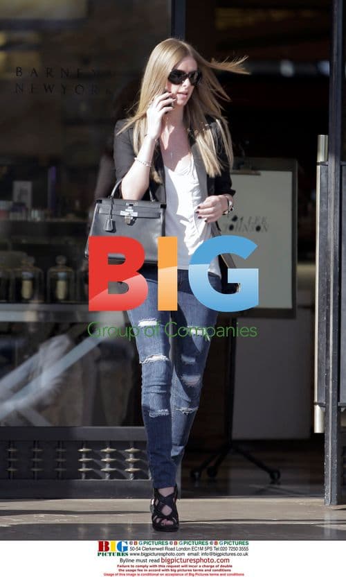 Nicky Hilton Leaves Barneys in Ripped Jeans