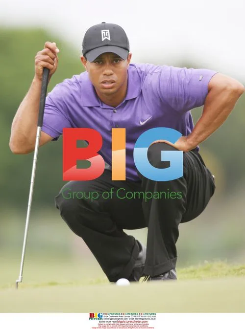 Tiger Woods lining up putt at World Golf Championships