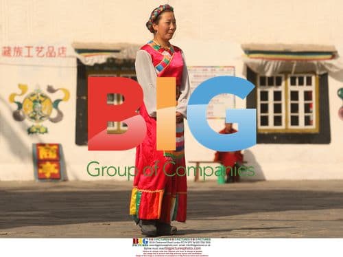 Chinese performer and monk at Lhasa replica in Beijing