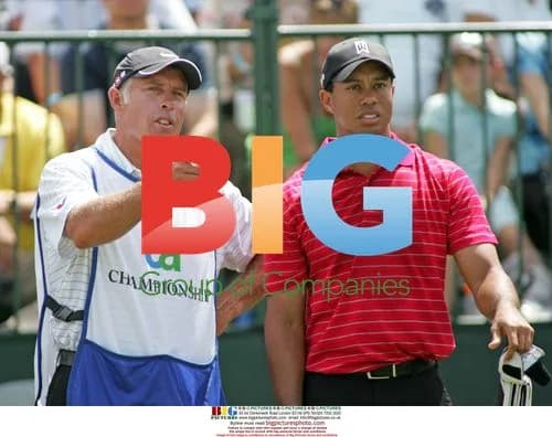 Tiger Woods and caddy at World Golf Championships