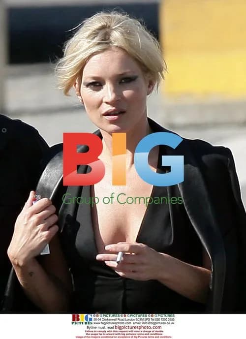 Kate Moss takes cigarette break during photo shoot