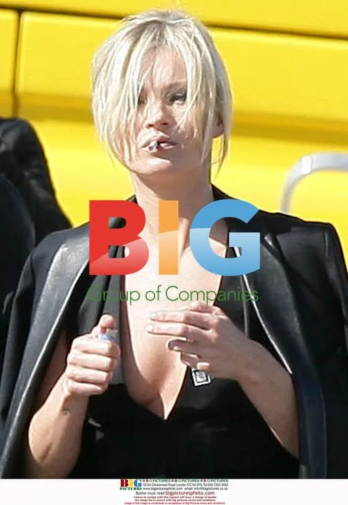 Kate Moss takes cigarette break at Paris photoshoot
