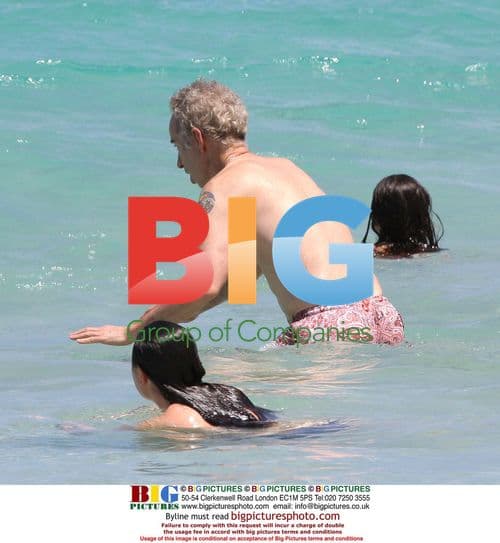 John McEnroe playing in the Caribbean sea