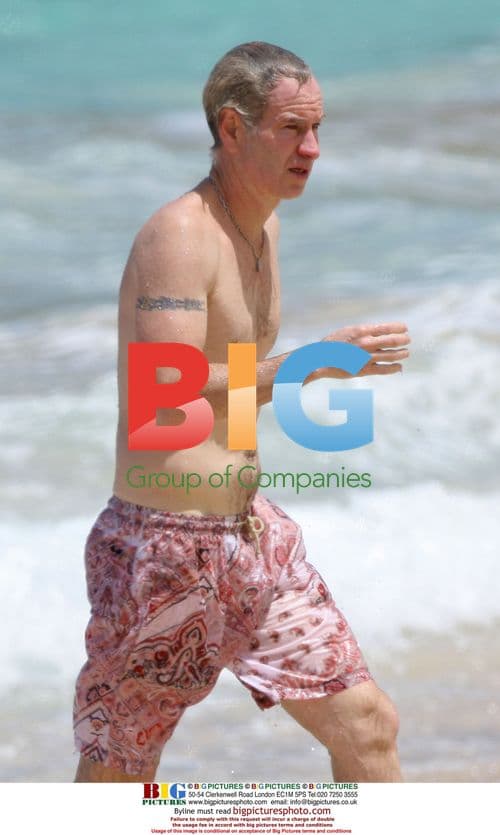 John McEnroe swimming in the Caribbean