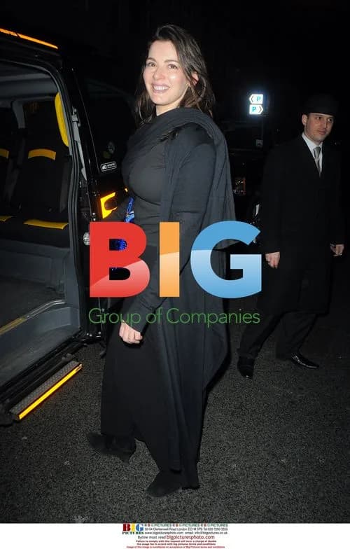 Nigella Lawson and her father outside restaurant
