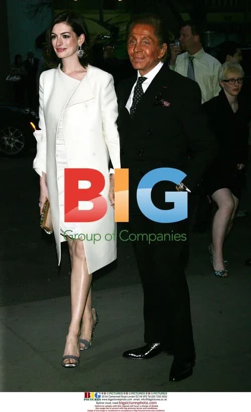 Valentino and Anne Hathaway at "Valentino: The Last Emperor" premiere