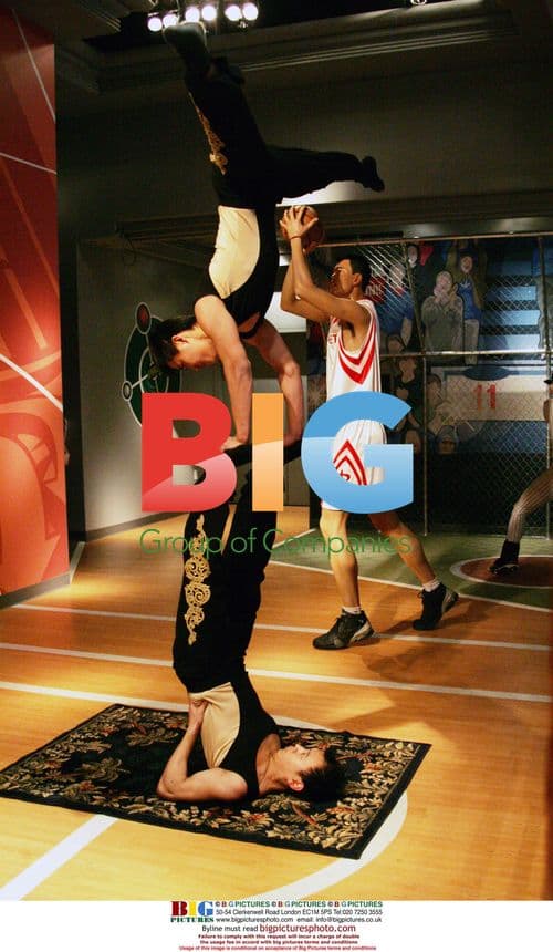 Chinese acrobats perform at Yao Ming wax figure unveiling