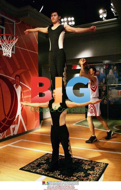 Chinese Acrobats Perform as Yao Ming Wax Figure Unveiled