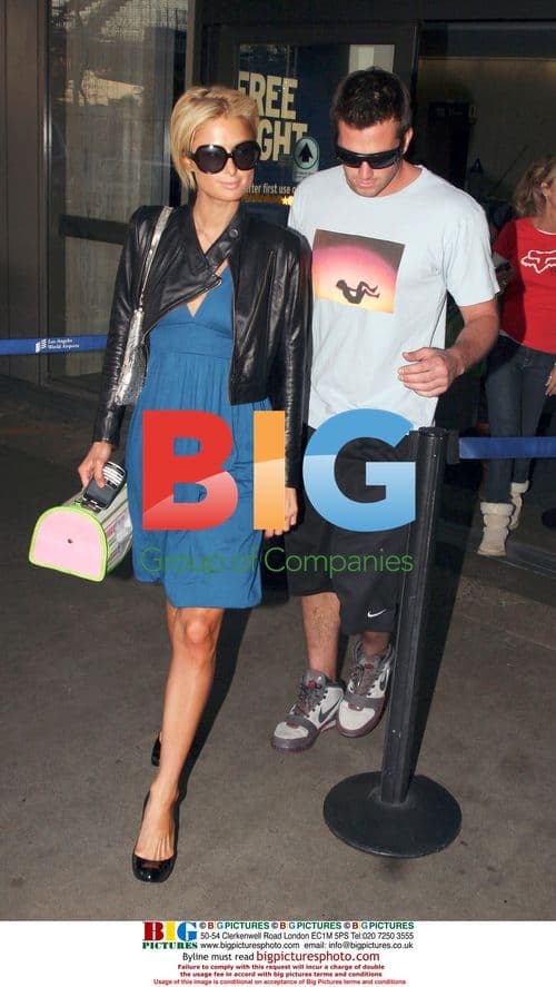 Paris Hilton and Doug Reinhardt Arrive at LAX
